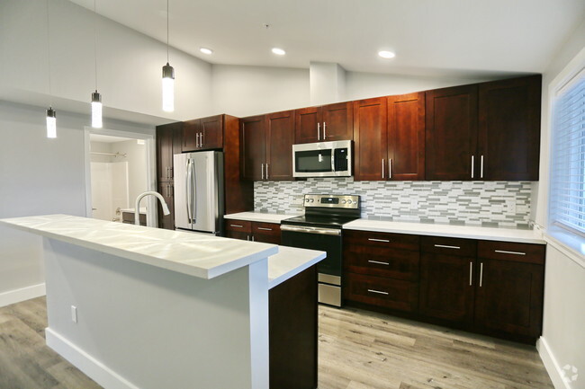 Cocina y bar - Highridge Apartment Homes