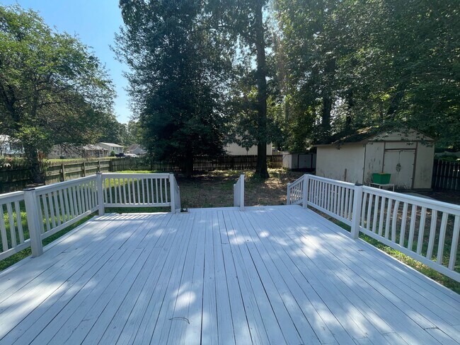 Building Photo - Updated Tri-Level home with solar panels!