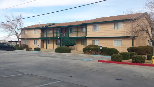 Newly painted and shingled buildings - College Heights Apartments