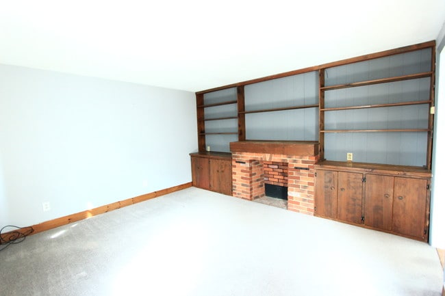 living room with fire place - 82 Flint St