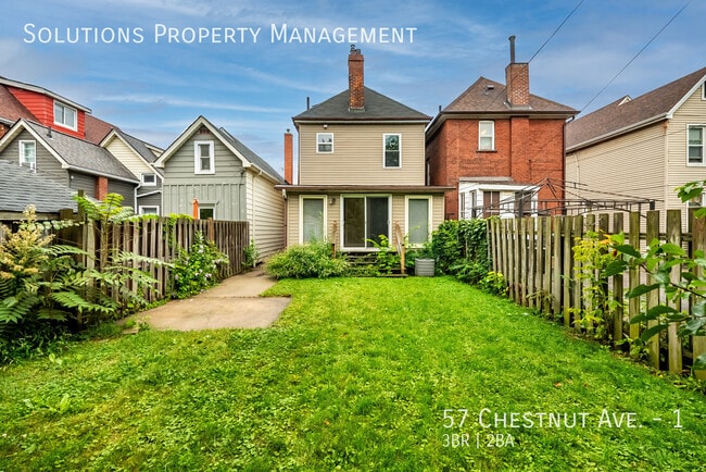 Building Photo - **Bright 3-Bedroom Home with Fenced Yard & Parking**