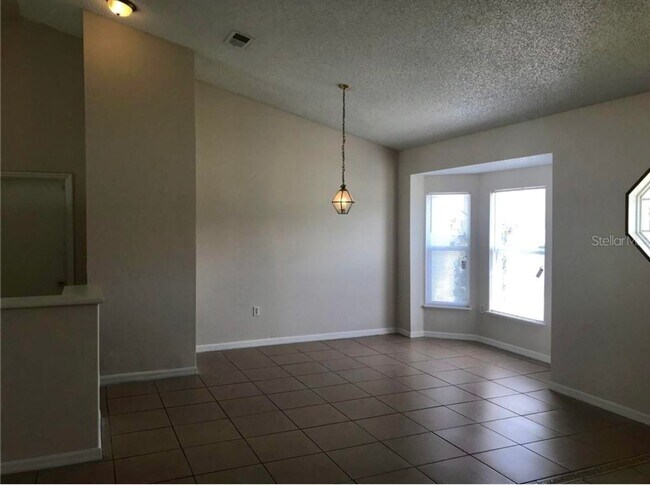 Building Photo - Poinciana 3 bedroom Oasis Now Available!