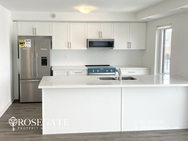Photo du bâtiment - Modern 2-Bedroom Townhouse with Balcony & Parking – Brampton