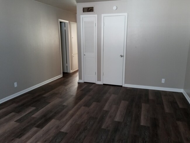 Hallway to bathroom. - 9901 E 12th St