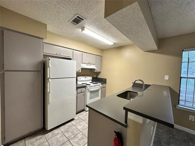 Foto del edificio - 4607 E 12th St