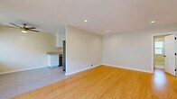 Located at 3910 Coco Ave. in Los Angeles, CA, this well-appointed single-floor unit offers three bedrooms, three bathrooms, and a thoughtfully designed layout. Warm bamboo-style hardwood flooring flows throughout the main living areas and bedrooms, creating a cohesive and inviting atmosphere.

The open living room is bright and airy, featuring recessed lighting, a ceiling fan, and large windows dressed with blinds that allow generous natural light to fill the space. The kitchen is efficiently designed with white shaker cabinetry, granite countertops, stainless steel appliances including a refrigerator and dishwasher, and light tile flooring—offering both style and practicality.

Each bedroom is comfortably sized, with the primary bedroom featuring built-in sliding closets with upper cabinetry, providing ample storage. Additional bedrooms also include built-in closet systems with the same clean, white finish. Recessed lighting and neutral wall tones keep each room feeling bright and versatile.

The bathrooms are finished with tile flooring and tasteful fixtures. One bathroom showcases a marble-top vanity with brushed nickel hardware, while another includes a tiled walk-in shower. Three connecting hallways provide a practical flow between all rooms, completing this functional and well-maintained Los Angeles residence.