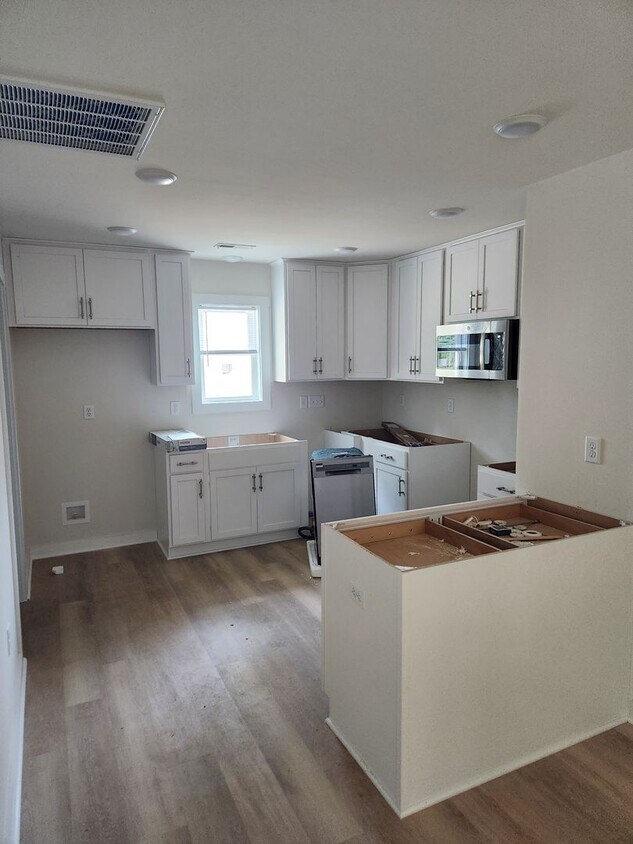 Building Photo - New Construction convenient to Downtown Bl...