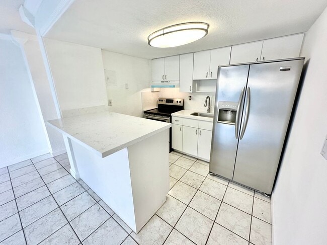 Building Photo - 4275 NW S Tamiami Canal Dr