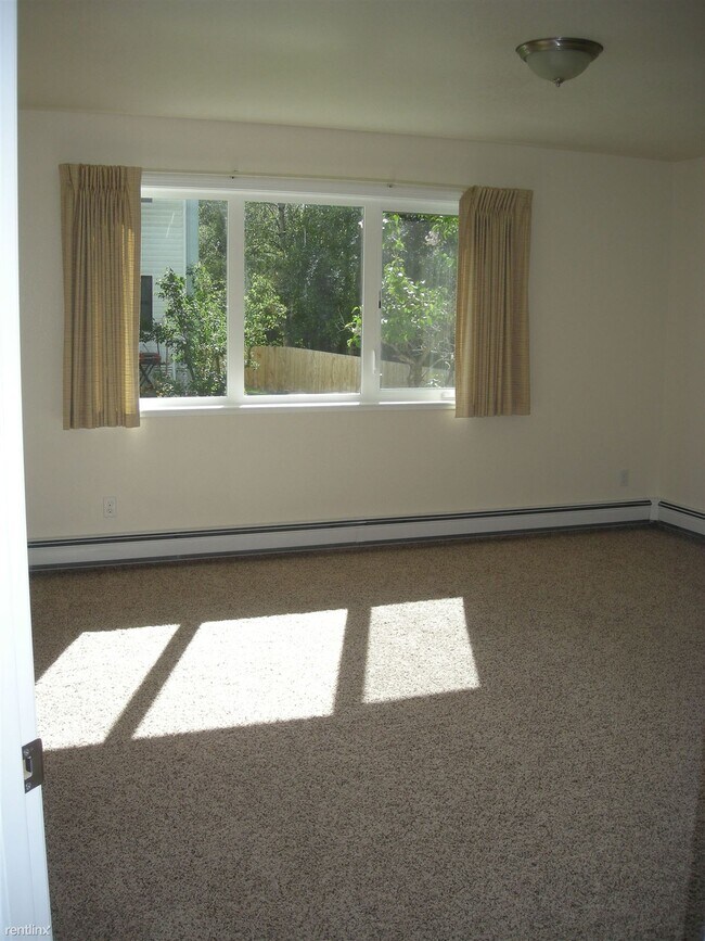 Foto del edificio - 2 br, 1 bath 4plex - 712 W 47th Ave Apt 3 #3