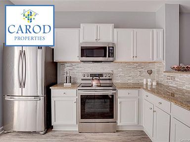 Building Photo - Concord Tri Level Four Bedroom Townhome