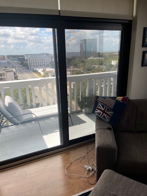 view of wraparound balcony from living room - 400 E Colonial Dr