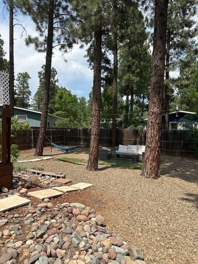 Building Photo - Fully Furnished 3-Bedroom Home with Spacio...