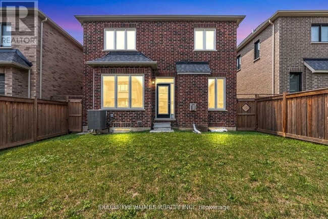 Photo du bâtiment - 1221 Raspberry Ter