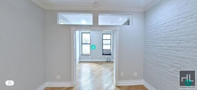 Foto del edificio - Renovated East Village 1-Bedroom with Brig...