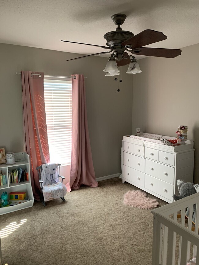 Building Photo - Spacious 4-Bedroom Home with 2.5 Baths in ...