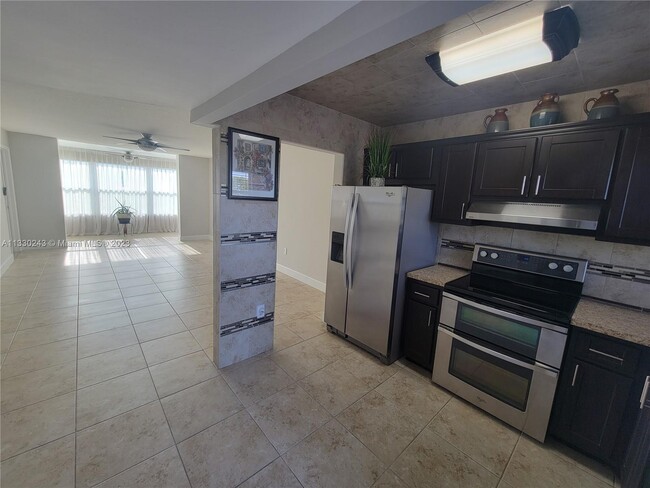Building Photo - 8110 Sunrise Lakes Blvd