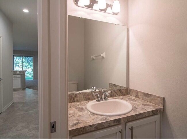 1/2 bathroom to the right once you walk in - 1082 Grantham Dr