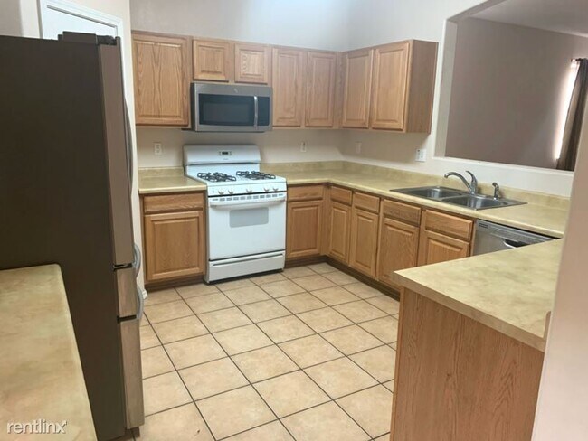 Building Photo - 4 br, 2 bath House - 4420 Santa Lucia