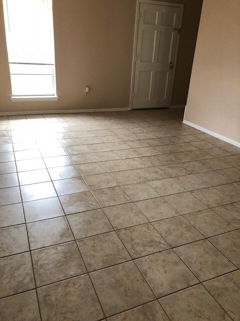 Tile floors on 1st fl - 1617 Brockenbraugh St
