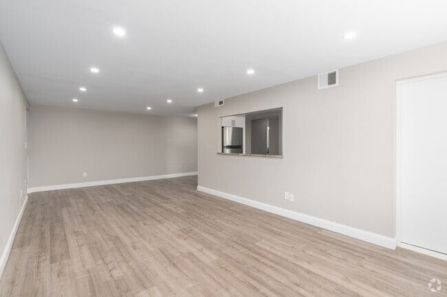 3BR, 2BA - 1,522SF - Living Room - Olympic Gardens