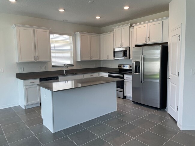 Photo - 4 bedroom home $2,195/mo, Storey Creek