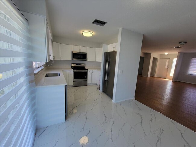 Building Photo - 3413 Port Charlotte Blvd