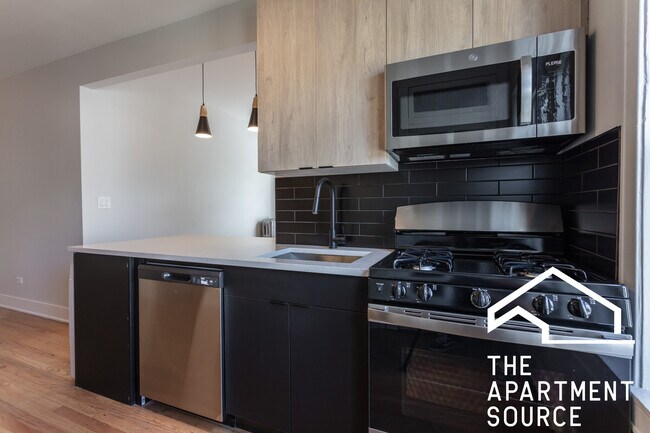 Foto del edificio - 4011 N Lowell Ave