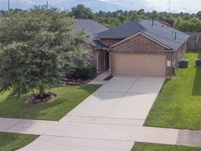 Building Photo - 24423 Raindrop Poppy Dr