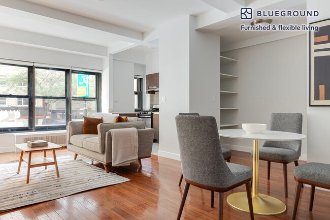 Building Photo - 400 E 57th St