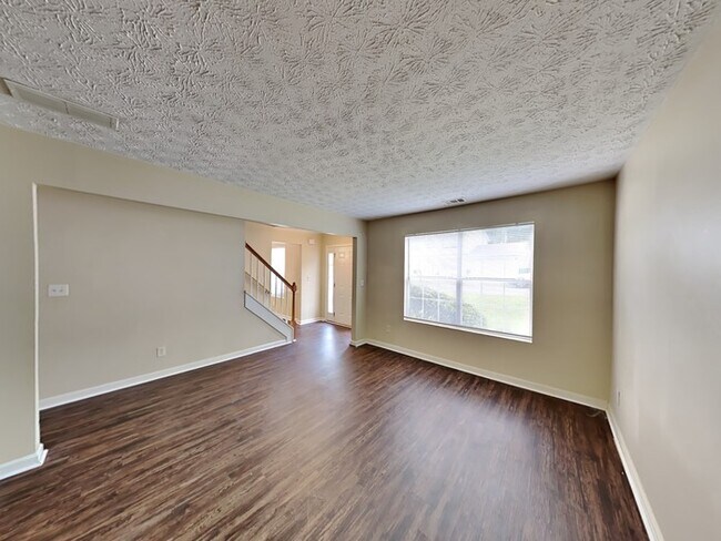 Building Photo - One Month Free! Charming 4 Bedroom Home lo...