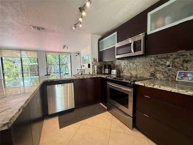 Building Photo - 9872 Costa Del Sol Blvd