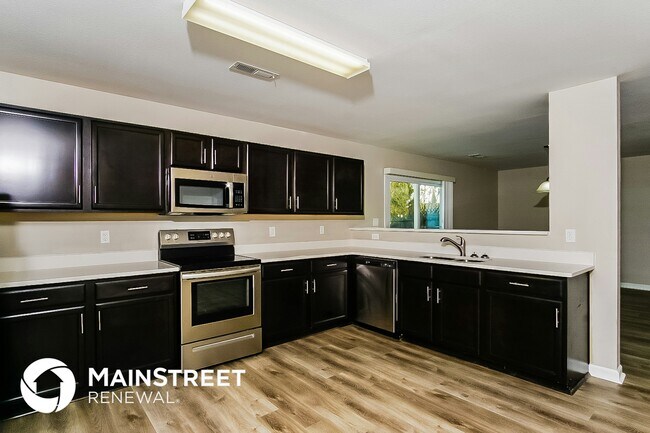 Foto del edificio - 15241 Tyler Mill Dr