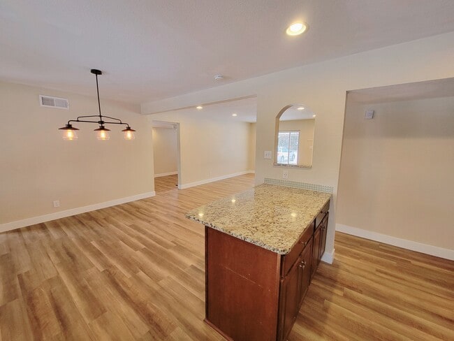 View of dining/living from kitchen island - 1170 Racine Street