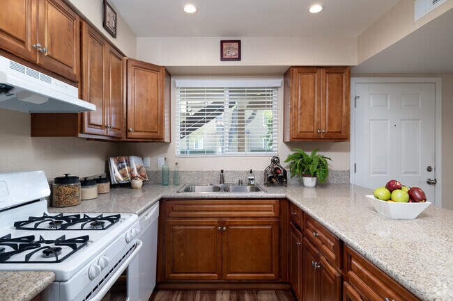 2 habitaciones, 2 baños, 1093 pies cuadrados, cocina - Sycamore Terrace Apartments