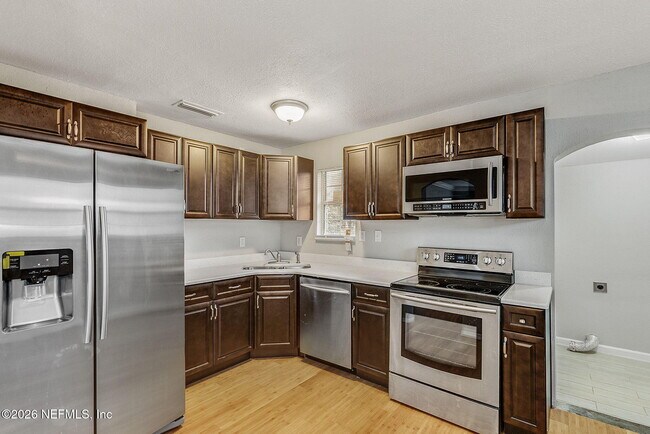 Building Photo - 4472 Melvin Cir E