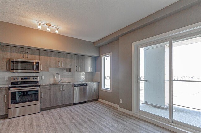 Photo du bâtiment - 4641-2128 128 Ave NE