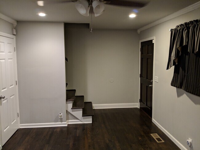 living room and stairwell to bedrooms - 715 Joseph Ave.