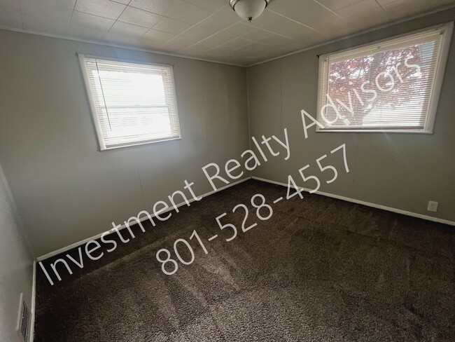 Building Photo - Single Family Home in Midvale!