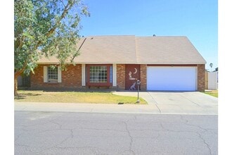 Building Photo - 6941 W Vermont Ave