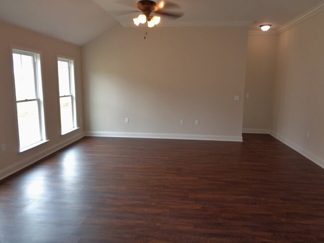 Building Photo - Spacious 4BR Home with Open Split Floor Plan, Granite Kitchen & Fenced Yard