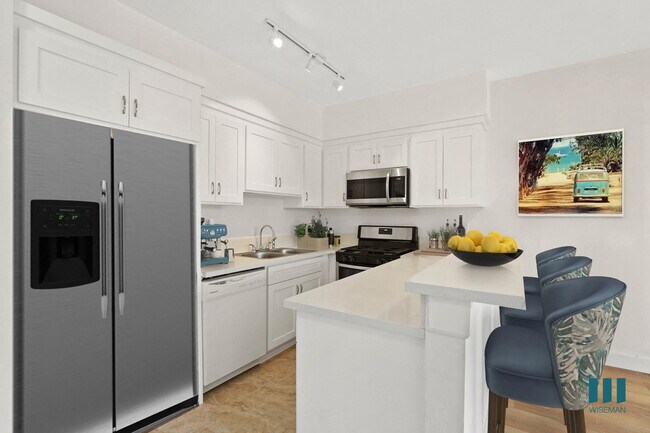 Kitchen with Stainless-Steel Dishwasher, Stove, and Microwave Oven - Overland Century