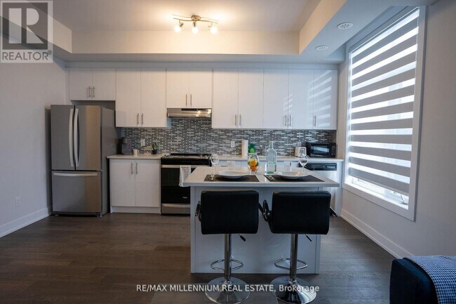 Photo du bâtiment - 9560-9560 Islington Ave