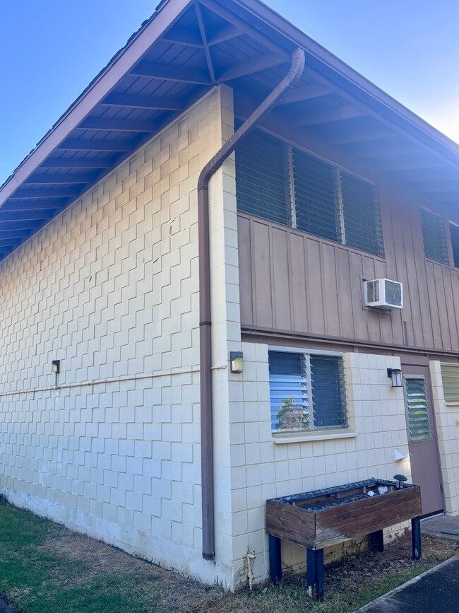 Building Photo - Available Now | 2 Bedroom, 2 Bathroom Townhouse with 1 Assigned Parking Stall at Tropic Gardens 1