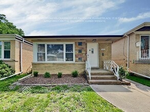 Building Photo - 5451 N Nagle Ave