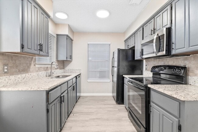 Foto del edificio - 9672 Windy Ridge Rd