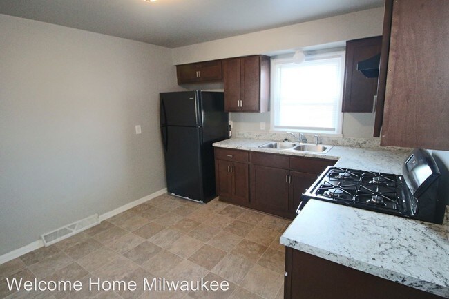 Building Photo - 8233-8235 W Villard Ave