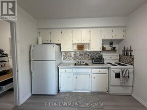 Building Photo - 114 Seventh St