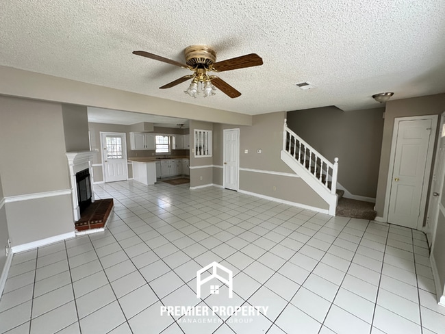 Photo - Charming 2BR/2.5BA Townhome | Dual Primary Suites, Fireplace & Fenced Yard
