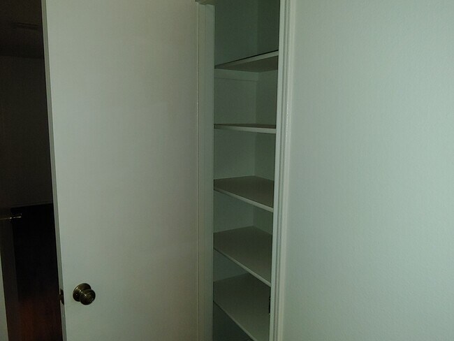 Hallway closet. - 6466 Beech Trail Dr