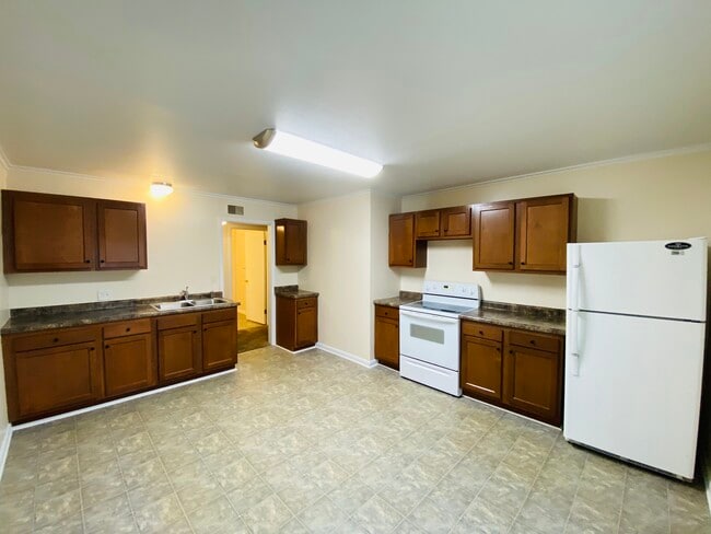 Kitchen with area for dining table. - 330 Rice St
